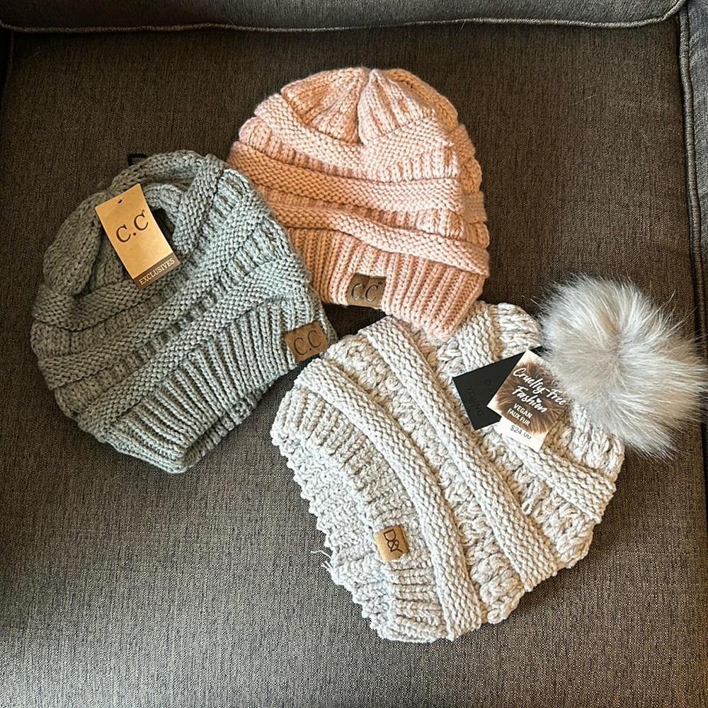 Brrrr! 3 Woman’s knit hats! 2 new and 1 barely worn. C.C + D&Y manufacturers.